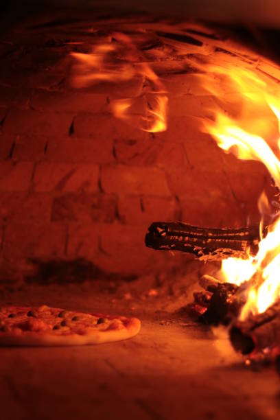 istock Traditional italian Pizza in Brick oven 911802464