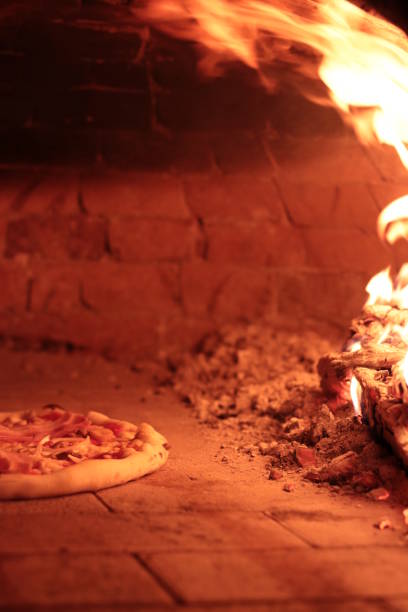 istock Traditional italian Pizza in Brick oven 911802466