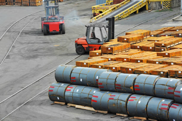 istock Rusty rolled metal in port 911802702