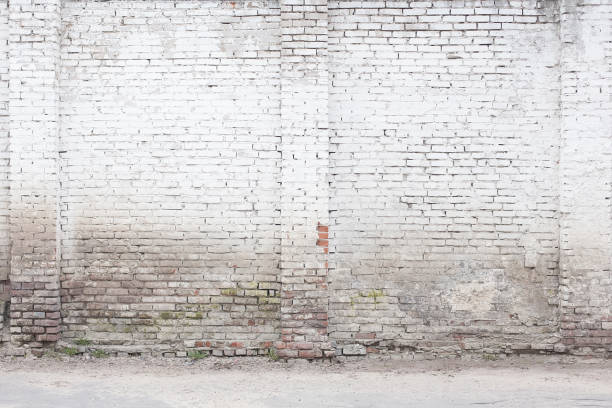 Abstract White Brick Background Old White Brick Wall. Abstract Whitewash Brickwall Background Texture. Grunge Wallpaper or Web banner With Copy Space For design graffiti brick wall dirty wall stock pictures, royalty-free photos & images