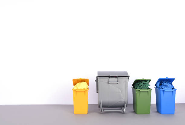 istock Colorful recycle bins on white background 911807964