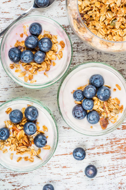 istock Yogurt with Homemade Granola and Blueberries 911808008
