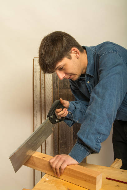 istock young men working on wood 911811750