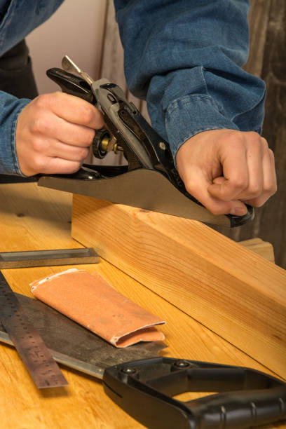 istock young men working on wood 911812614