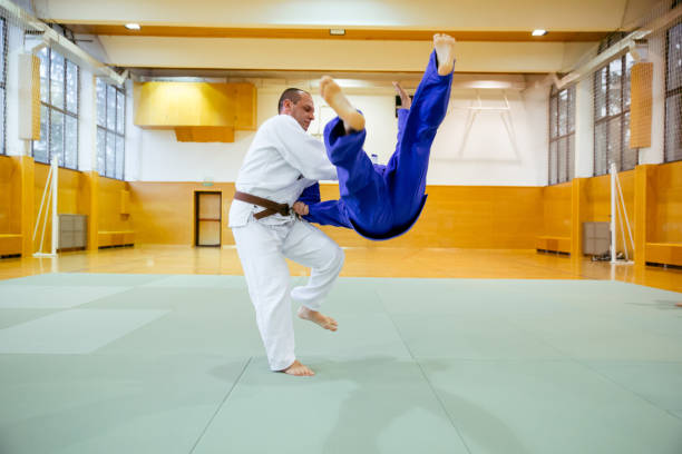 istock Judoist Fighters Competing In Judo Match 911812822