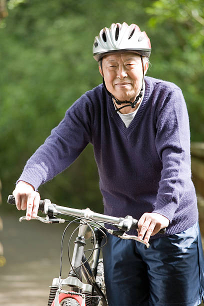 istock Senior asian biking 91181568