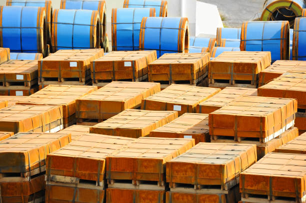 istock Rusty rolled metal in port 911823910