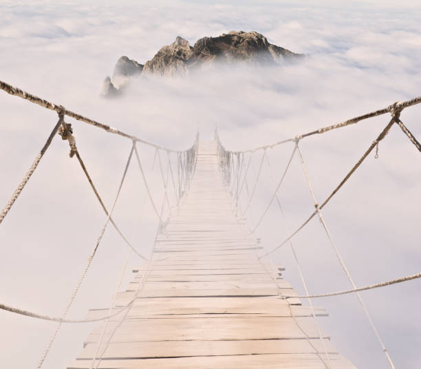 istock rope bridge with wood planks 911824404