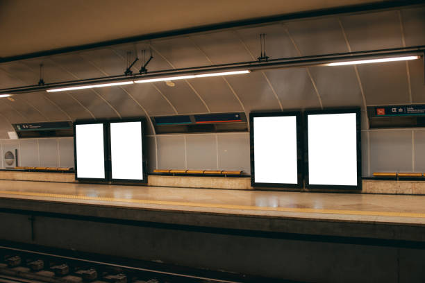 four blank billboards inside subway station - subway station billboard poster billboard posting imagens e fotografias de stock