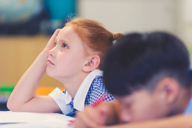 School children bored and tired in class.