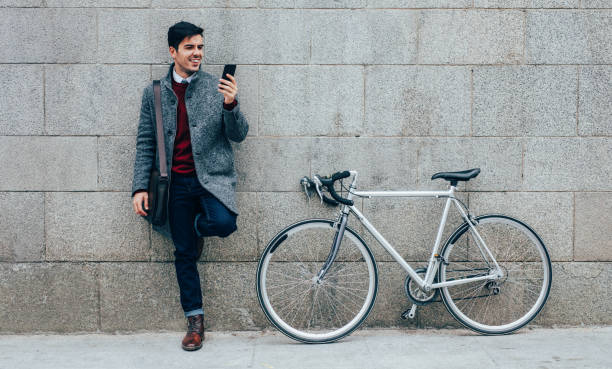 istock Bicyclist texing in the city 911843868