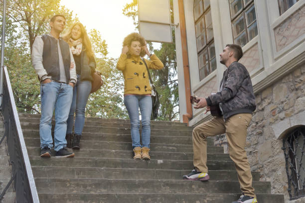 istock Happy, young people on a walk after a rain. 911852218