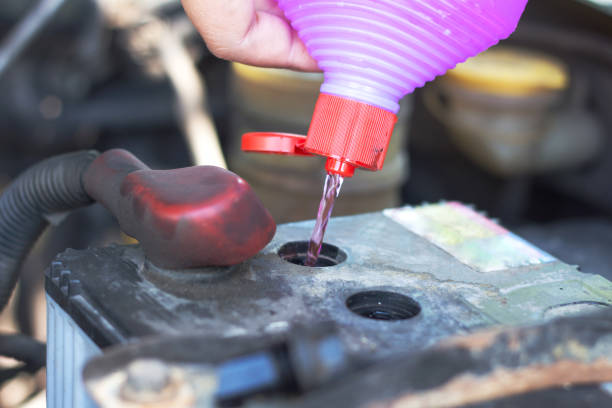 istock Fill distilled water in the battery 911870898