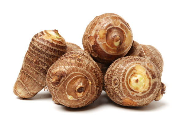 istock Taro potato roots  on Isolated white background 911882738