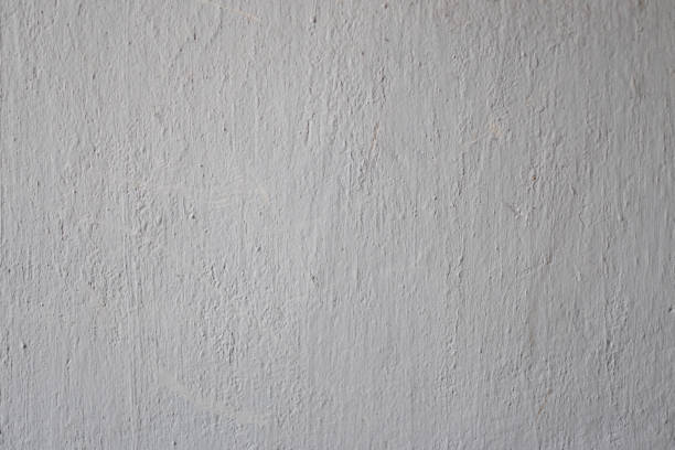 istock White texture paint with shades of gray. 911891904