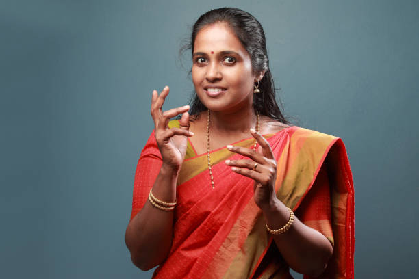 istock Traditionally dressed South Indian woman with surprised face 911901608