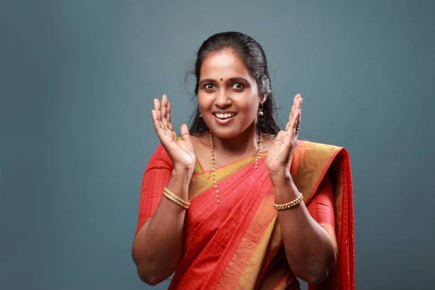 Traditionally dressed South Indian woman with surprised face