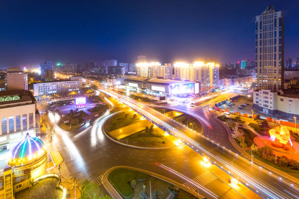 istock road junction and modern buildings at night 911903816