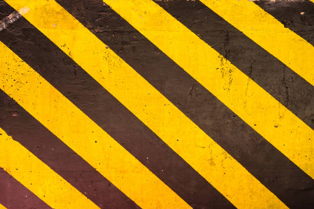 istock Yellow and black traffic sign on rusty metal. 911907946