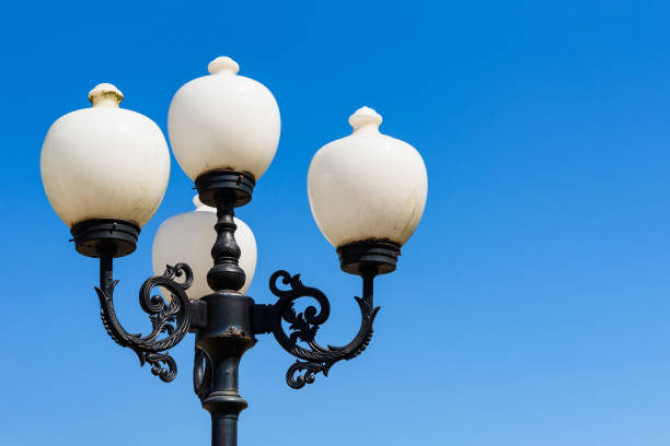 istock Street lights against a blue sky day. Space for text. 911908040
