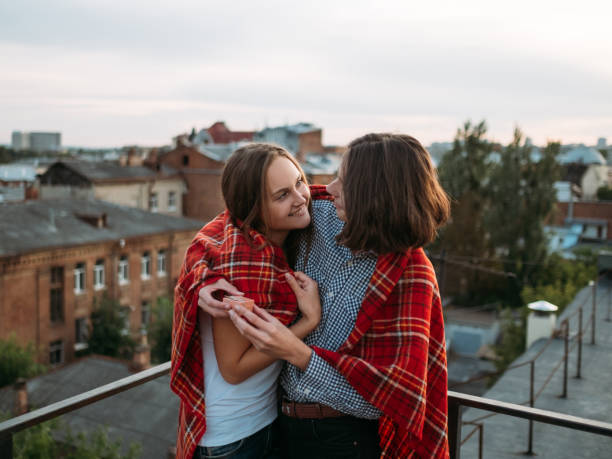 istock love couple rooftop hug happiness emotion 911922310