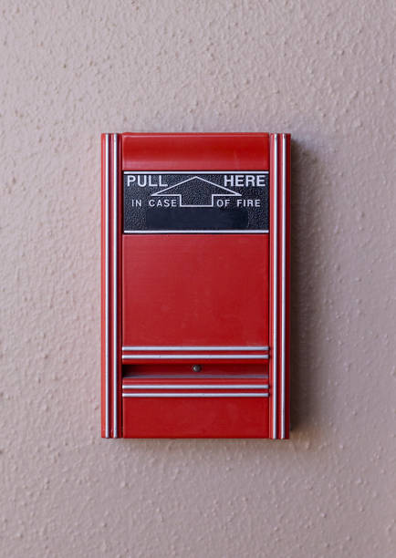 istock A simple red fire alarm on a white textured wall in a public building 911925474