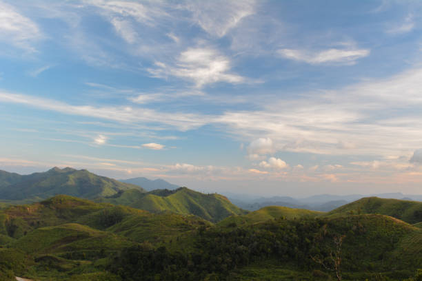 istock Beautiful mountain landscape, with mountain peaks covered with forest and a cloudy sky 911925560