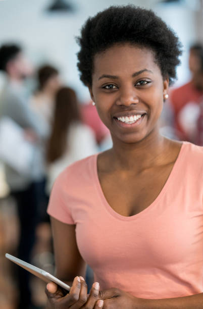 istock Happy black woman working at a creative office 911928722