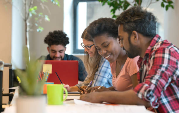 istock Group of people working online at a creative office 911928750