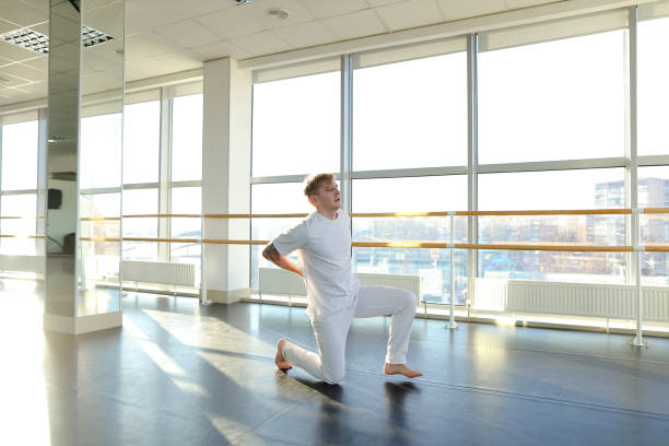 istock Athlete in sportswear on first training after getting injured 911930404