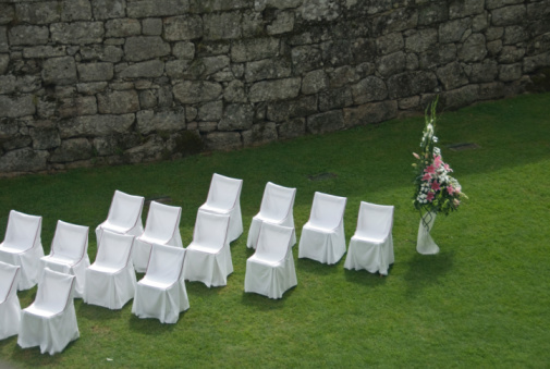 chairs and flowers prepared for wedding guests