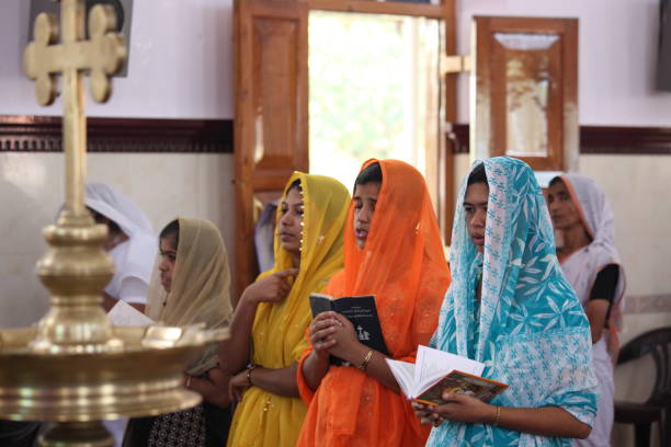 Pictures of people worshiping Jesus in Kerala. stock photo