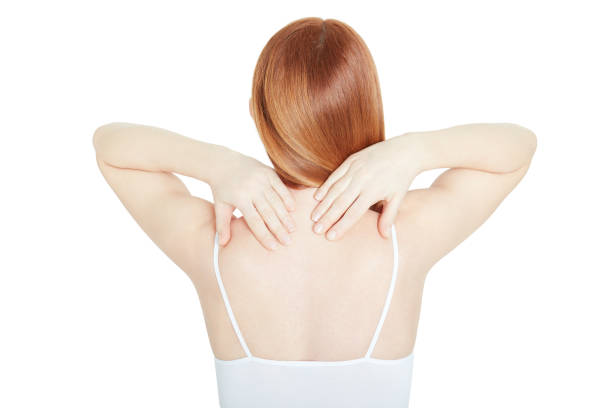 Young woman back with neck pain isolated on white, clipping path