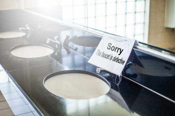 istock Labels identify malfunctioning faucets in the bathroom 911961186