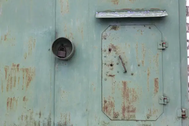 Photos of elements of metal structures, old paint and rust.