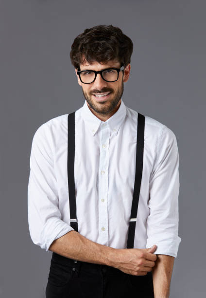 istock Businessman folding sleeve against gray background 911964264