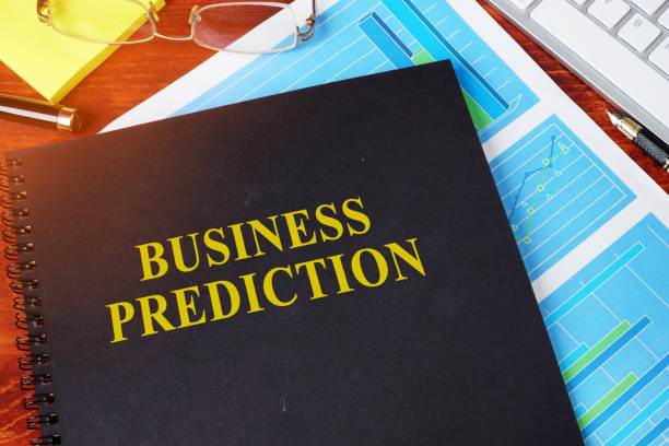 istock Business Prediction concept. Book and financial charts. 911964566