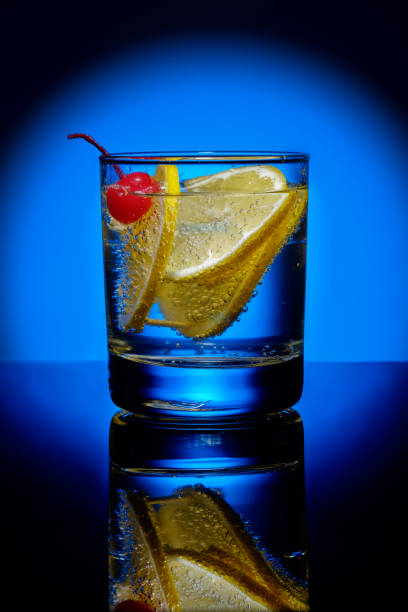 istock Refreshing Blue Hawaii Cocktail Punch with lemon and Cherry 911966956