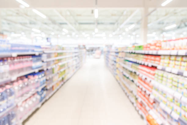 istock Blurred background-abstract blur shopping mall store interior. 911970374