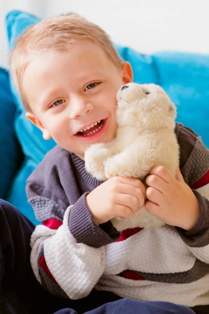 istock Boy and his Teddy bear 911970490