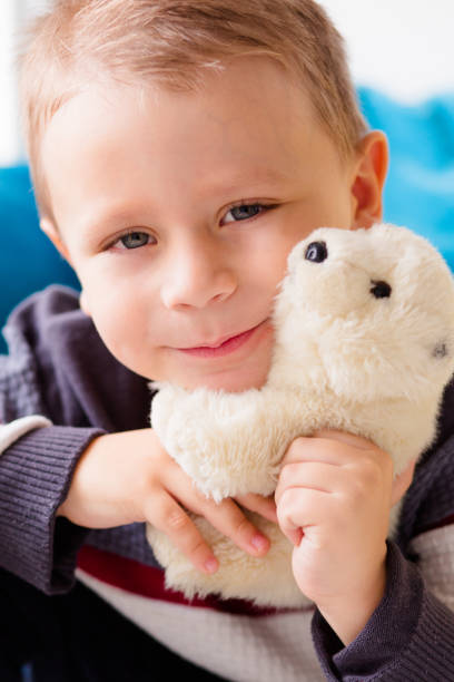 istock Boy and his Teddy bear 911970568