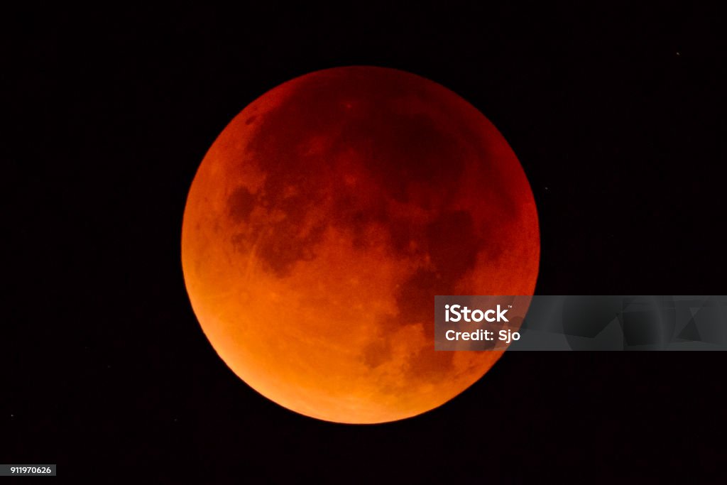 Blood moon - full Lunar Eclipse in the night sky Full lunar eclipse taken from Western Europe on September 28, 2015. A lunar eclipse (also known as a blood moon) occurs when the sun, Earth and moon are aligned and the Moon passes directly behind the Earth into its umbra (shadow). Lunar Eclipse Stock Photo