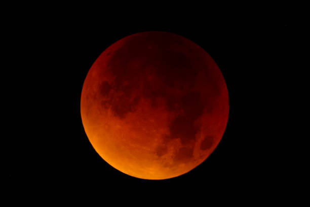 istock Blood moon - full Lunar Eclipse in the night sky 911970692