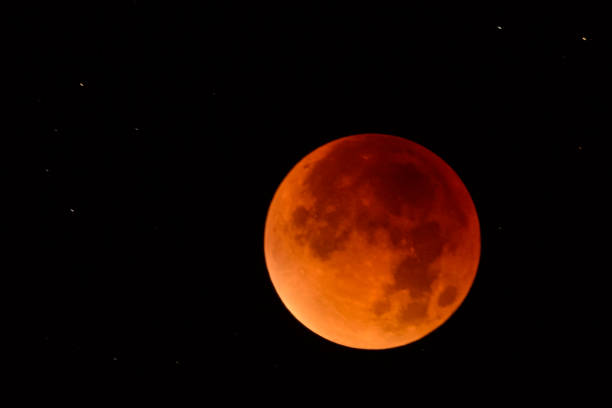 istock Blood moon - full Lunar Eclipse in the night sky 911970970