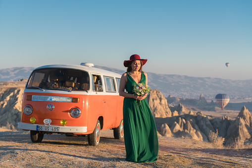 Cappadocia,Türkey - December 02, 2017:Hot air balloons flying over valley in the morning and people camping in Cappadocia. Turkey