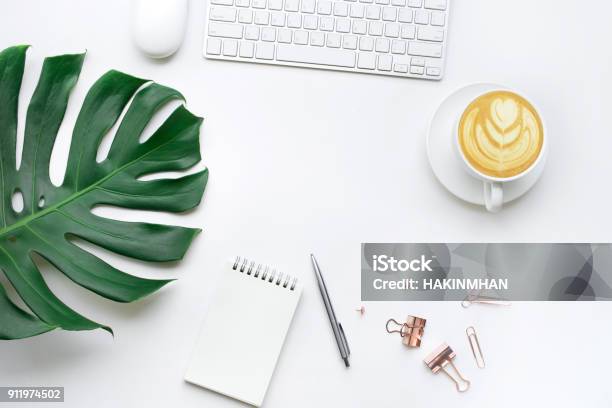 Top View Of Business Desk Table With Monstera Leaves And Mock Up Accessories On White Backgroundflat Lay Design Stock Photo - Download Image Now