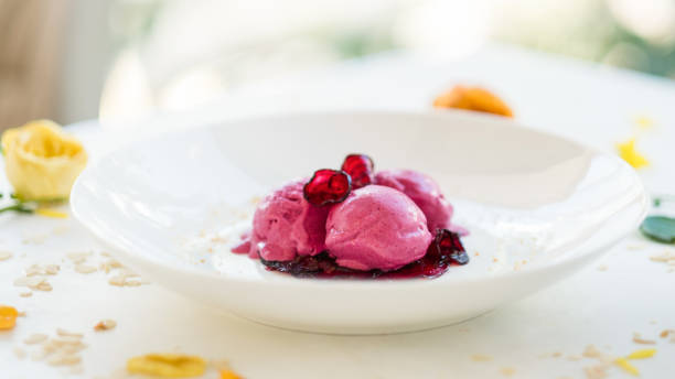 istock delicious refreshing pink ice cream balls 911978440