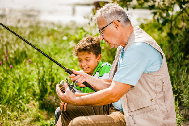 wędkowanie w rzece - fishing rod fishing fishing reel casting zdjęcia i obrazy z banku zdjęć