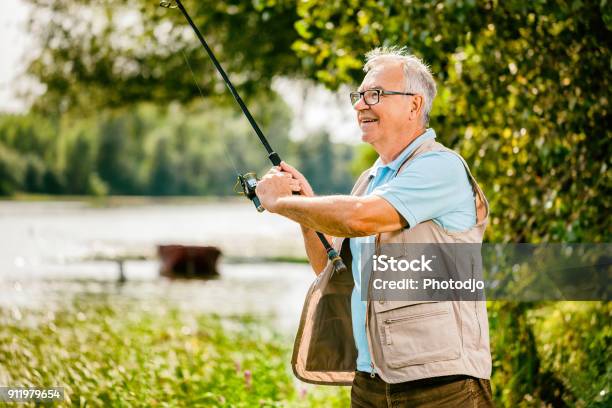 Senior Man Fishing Stock Photo - Download Image Now - Fishing, Senior Adult, Senior Men