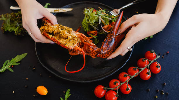 istock tasting restaurant stuffed lobster dish 911986680